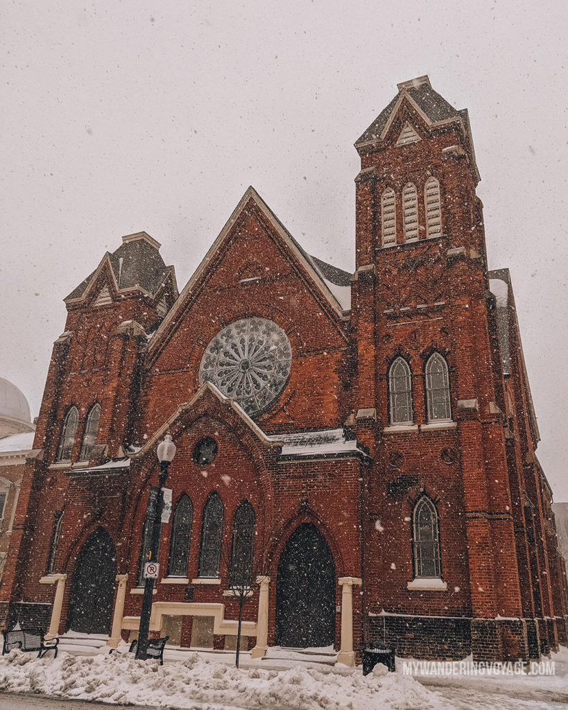 Snowy winter church in Ontario, Canada | With the powerful device in your pocket you can take incredible photos of your travels. Here is the ultimate guide to smartphone travel photography. | My Wandering Voyage travel blog #travel #photography #tips #travelphotography #smartphonephotography
