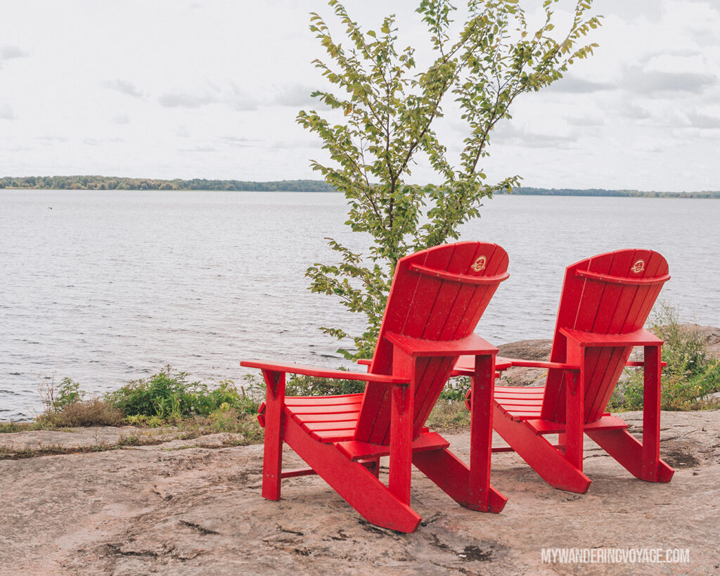 red chairs at Thousand Islands National Park | The Ultimate Guide to National Parks in Ontario | My Wandering Voyage travel blog #travel #Ontario #Canada #BrucePeninsula #ThousandIslands #camping