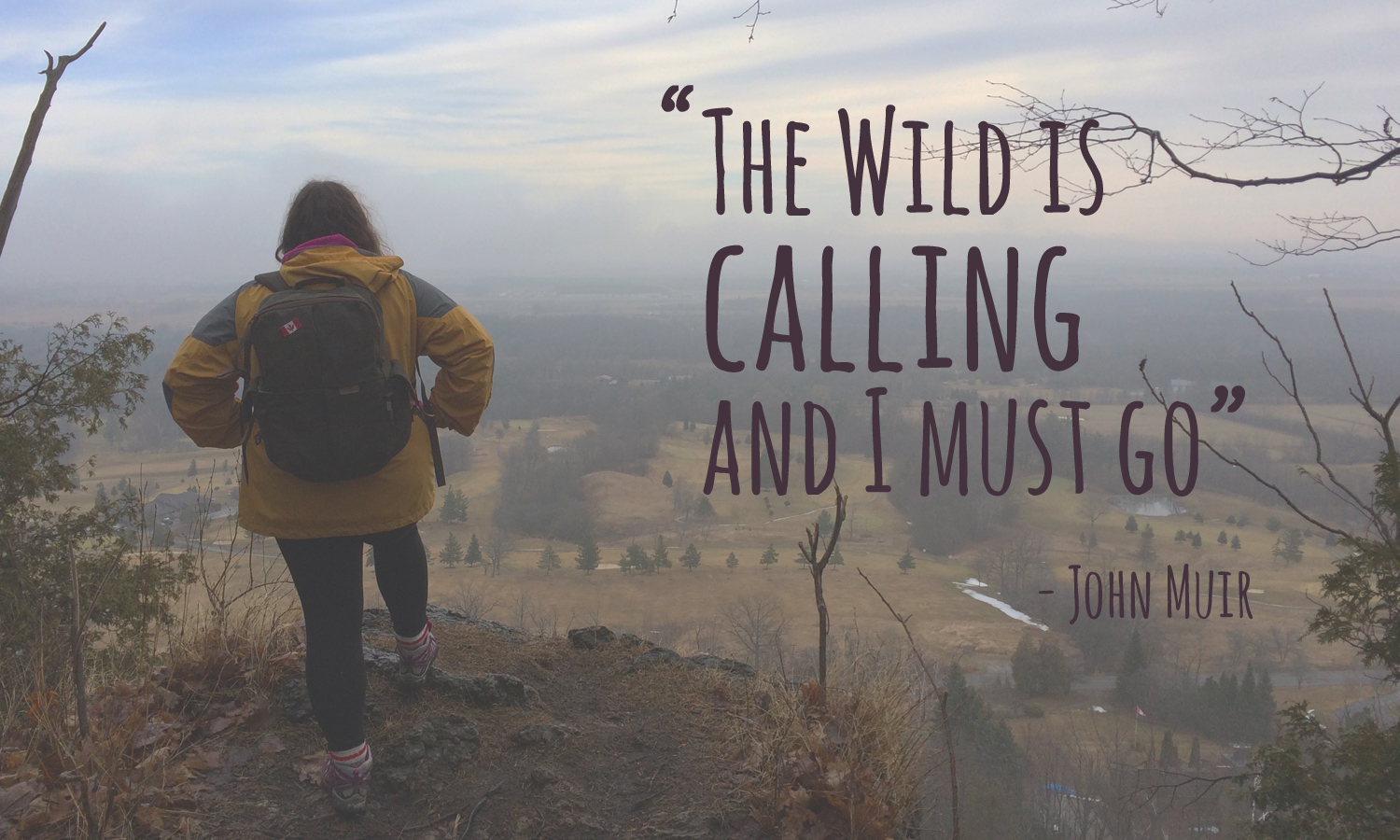 Olivia hiking with quote: The wild is calling and I must go.