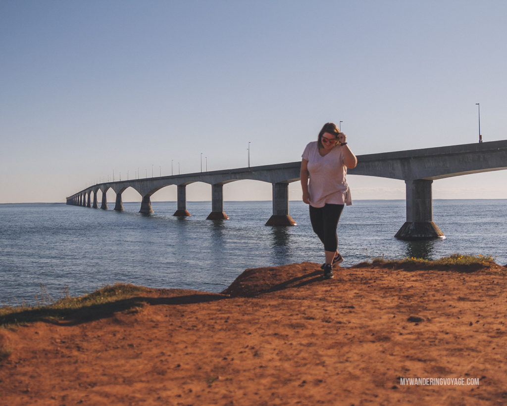 Confederation Bridge and red cliffs in PEI | When road trip season hits, don’t be caught unprepared. Make sure you have everything you need with this road trip packing list for a successful and enjoyable trip | My Wandering Voyage travel blog #travel #roadtrip #packing #USA #Canada
