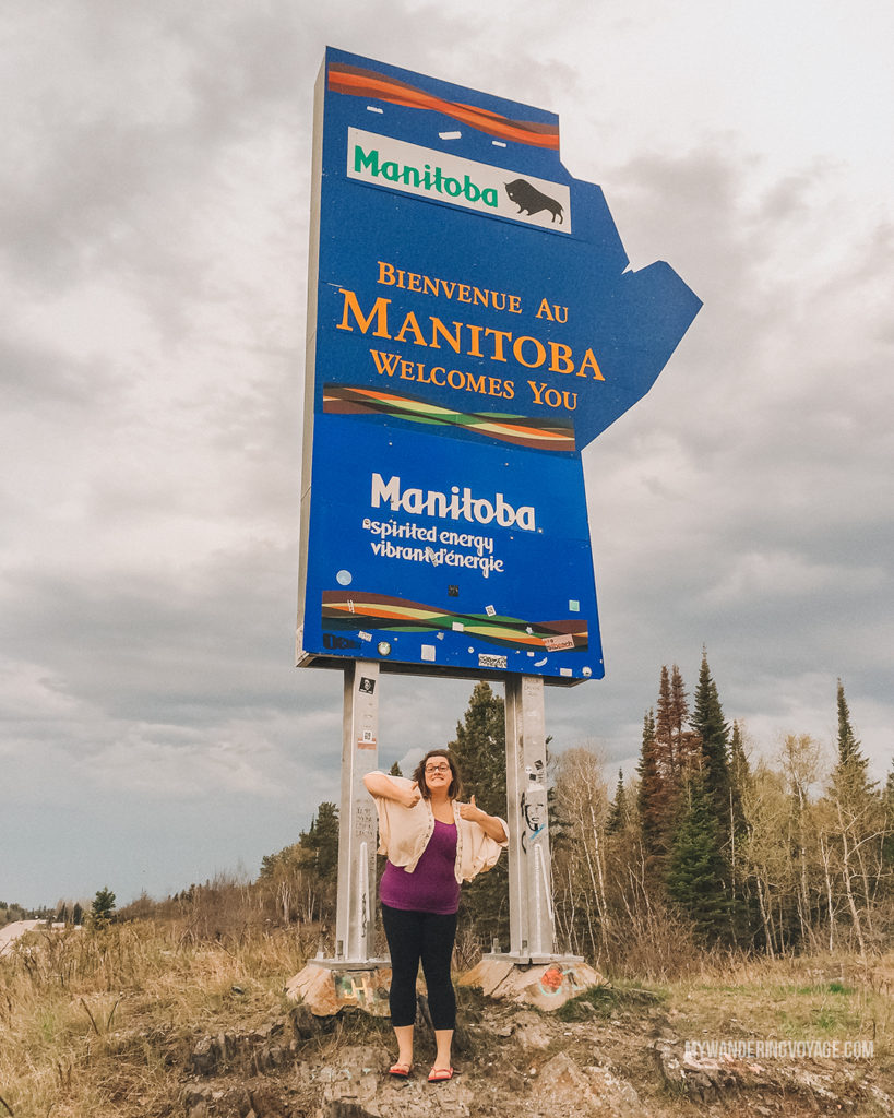 Welcome to Manitoba road sign | When road trip season hits, don’t be caught unprepared. Make sure you have everything you need with this road trip packing list for a successful and enjoyable trip | My Wandering Voyage travel blog #travel #roadtrip #packing #USA #Canada